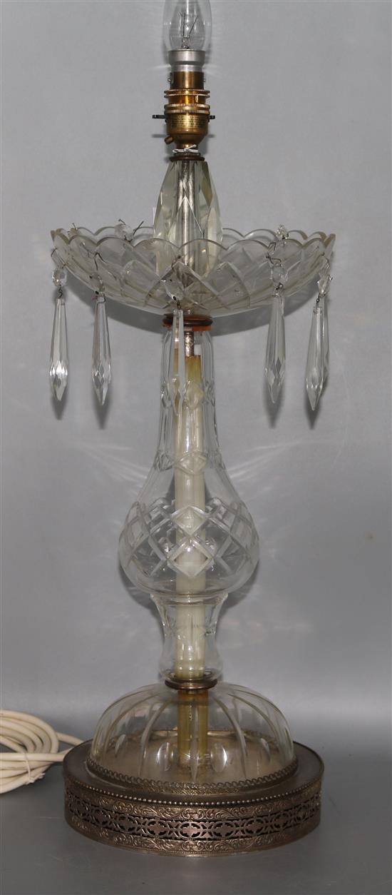 A cut glass lustre lamp